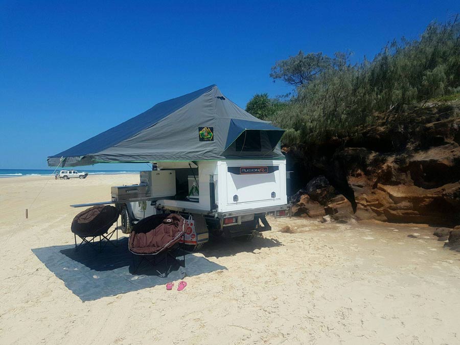 A custom Fusion RV camper on the beach!